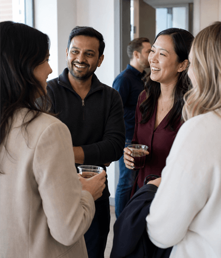 Attendees connecting in well-matched conversations at a Hoogah event